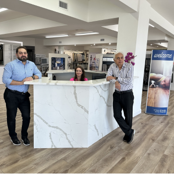 The Annapolis Carpet & Flooring family behind the front desk.